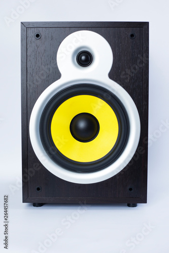 big subwoofer with yellow speaker on white background,loud music