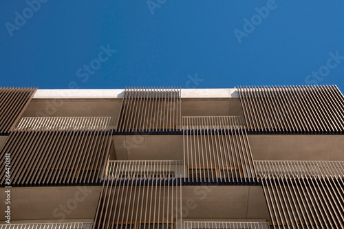 Tableau sur toile modern architecture with wood shading on the facade very modern and elegant