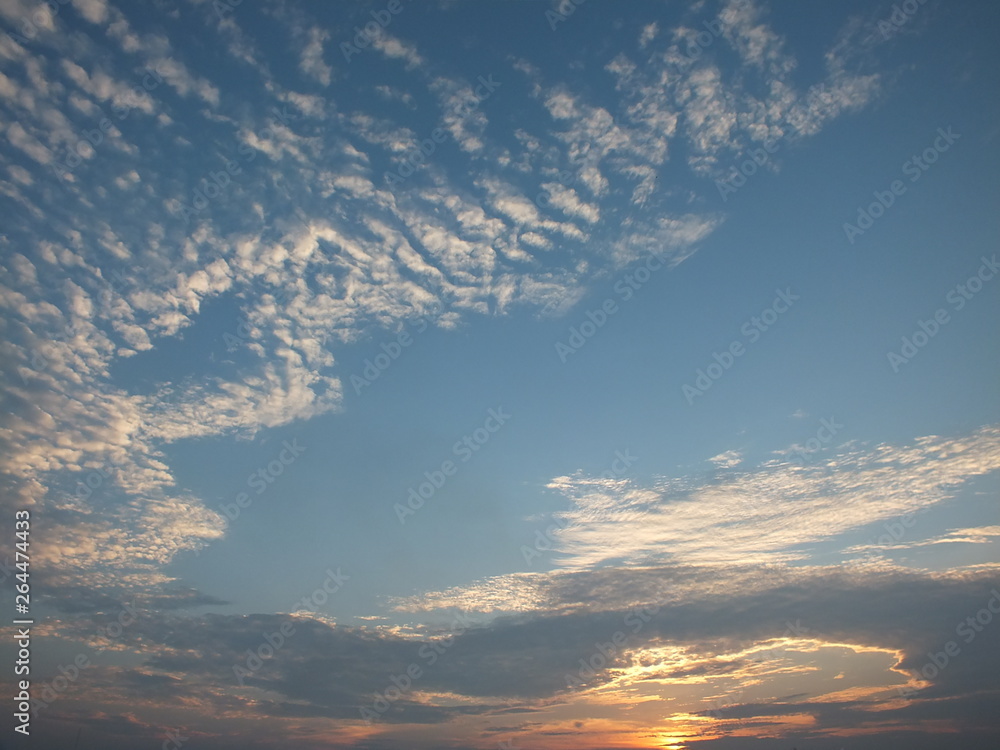 The sky is beautiful. With red, blue and clouds floating down the white color The sky is beautiful. With red, blue and clouds floating down the white color