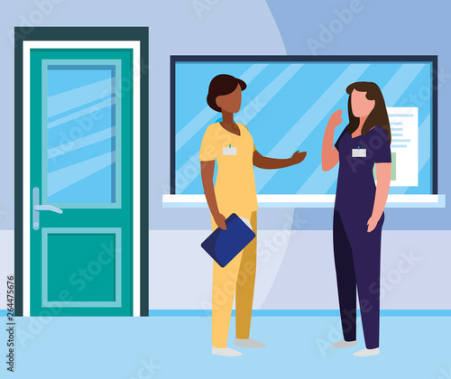 interracial female medicine workers in hospital reception
