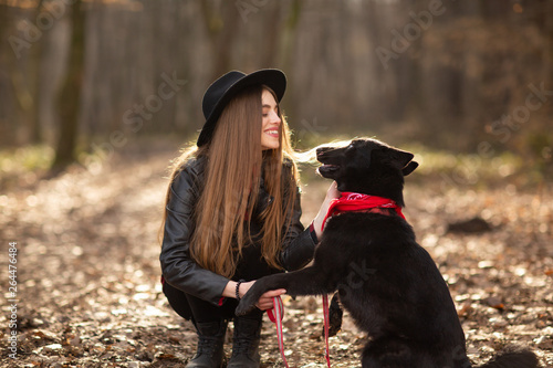 Pretty girl playing and having fun with her pet by name Brovko Vivchar photo