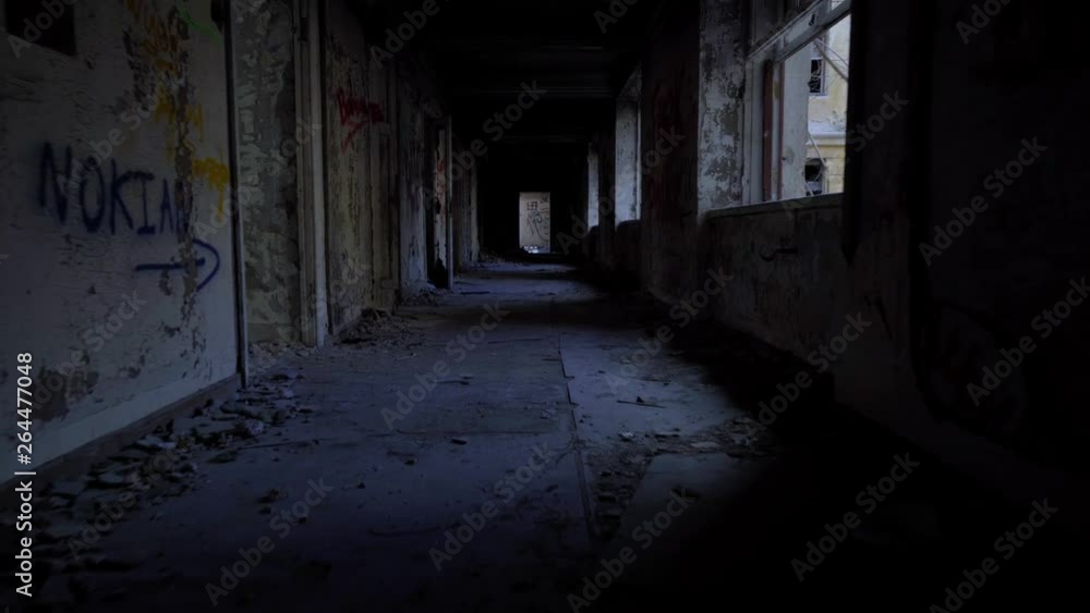 Ruined building way through a dark corridor Ruined building way through a dark corridor