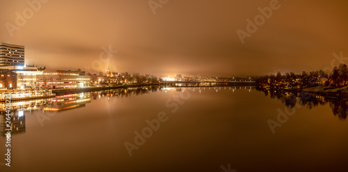 Panorama, foggy view from the central bridge over the river to central Umea city, Vasterbotten municipality, Sweden