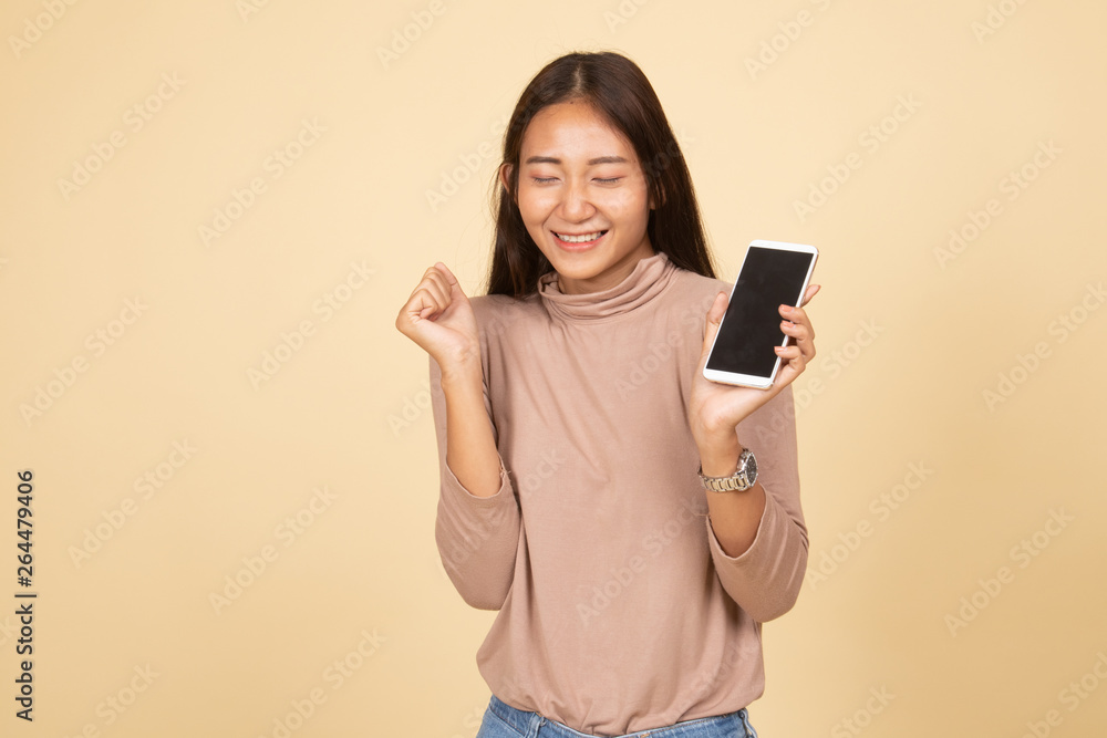Happy Young Asian woman with mobile phone. Happy Young Asian woman with mobile phone.