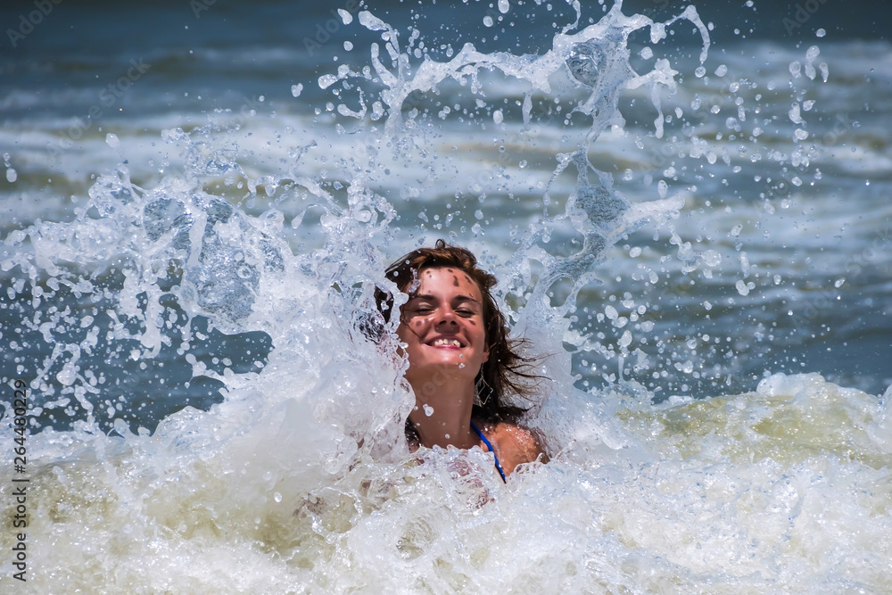 Happy girl in the sea