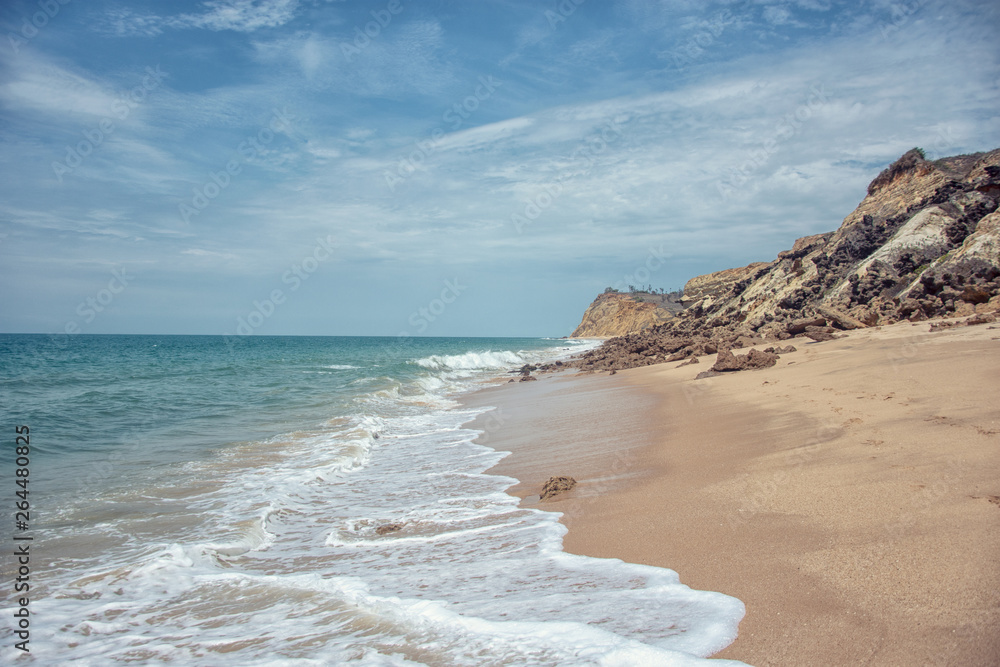 Beautiful sea cost view. Atlantic ocean costline, sandy beach Sangano, Angola under sunlight in summer sunny day Beautiful sea cost view. Atlantic ocean costline, sandy beach Sangano, Angola under sunlight in summer sunny day