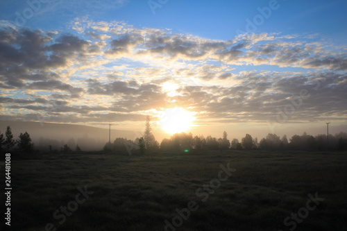 Hazy Landscape During Sunrise