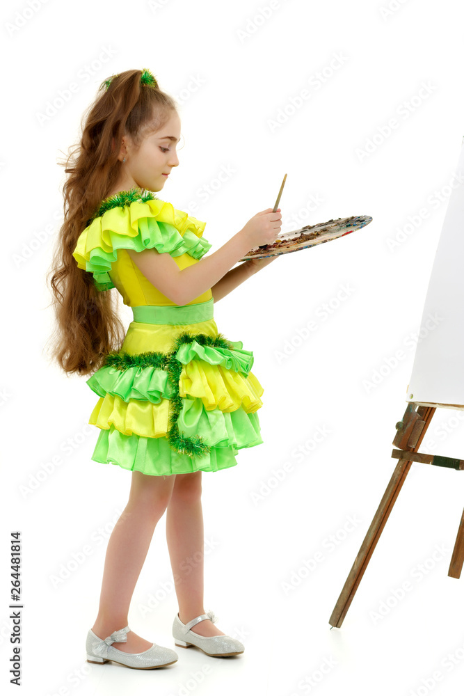 Little girl with palette and brush learning to draw. Little girl with palette and brush learning to draw.