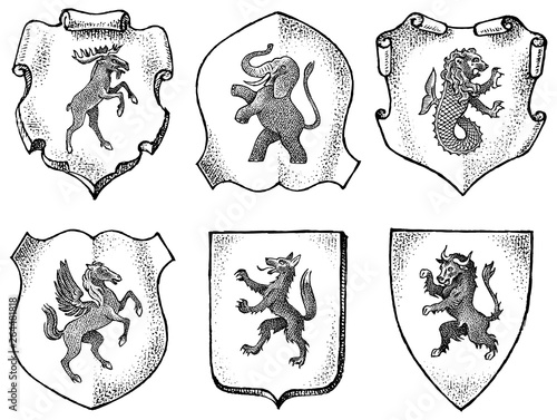 Heraldry in vintage style. Engraved coat of arms with animals, birds, mythical creatures, fish, dragon, unicorn, lion. Medieval Emblems and the logo of the fantasy kingdom.