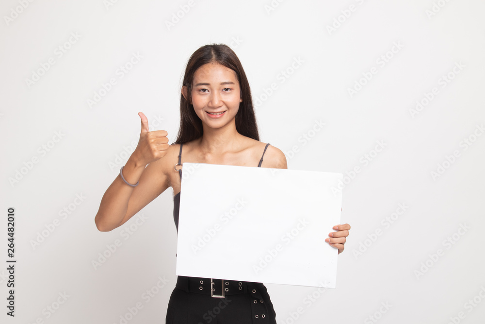 Young Asian woman show thumbs up with white blank sign. Young Asian woman show thumbs up with white blank sign.