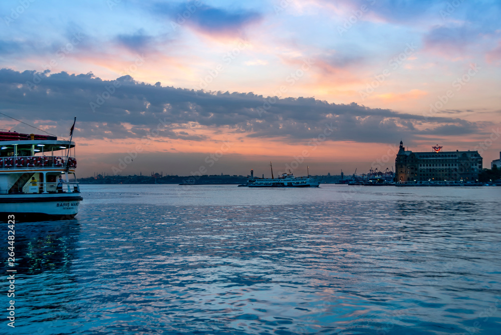 Obraz premium Istanbul, Turkey, 11 June 2007: Sunset of Kadikoy, Haydarpasa Railway Station