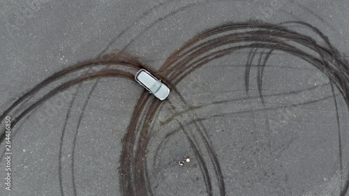 Aerial Ascend: Car Driving Circle Imprints In Sand in Solheimasandur, Iceland