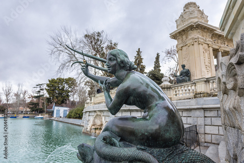 Mermaid sculpture on the terrace of statue of king Alfonso XII of Spain in Buen Retiro park, commonly known as El Retiro in Madrid city, Spain