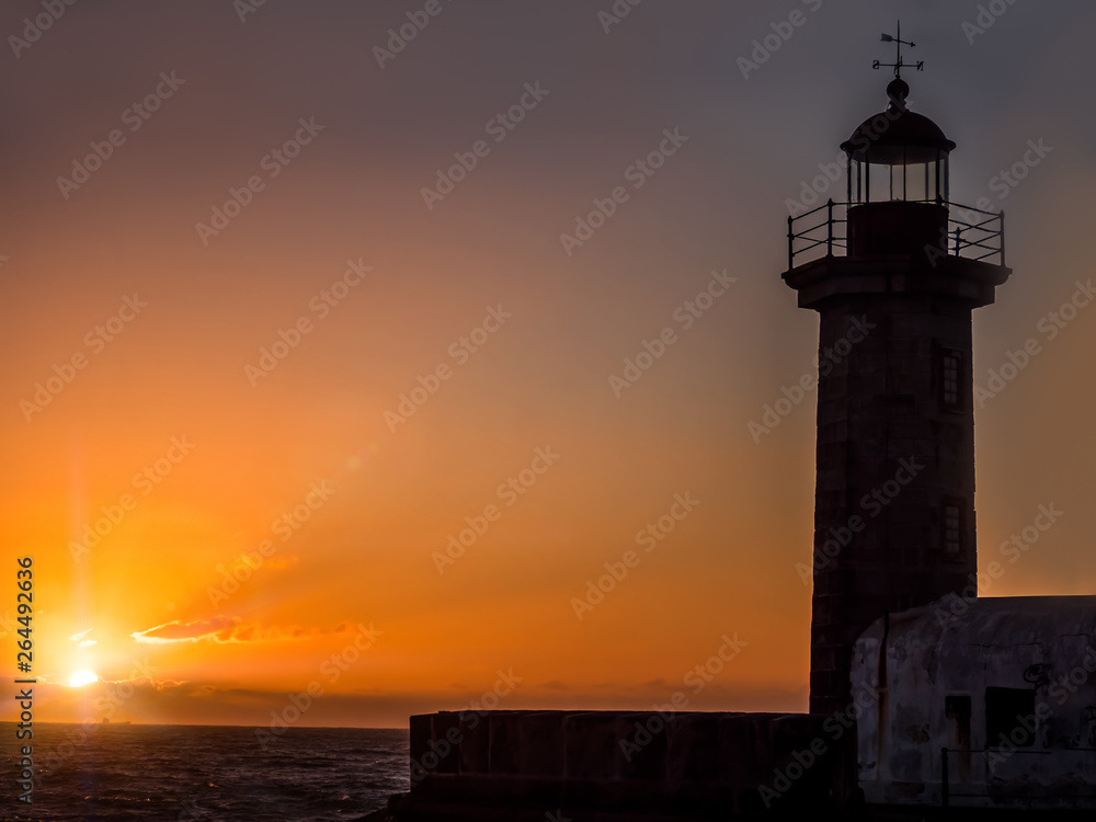 Lighthouse against the sunset, Porto, Portugal