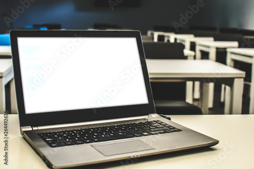 Laptop, online business, teacher work in the classroom.Laptop put on a table or desk