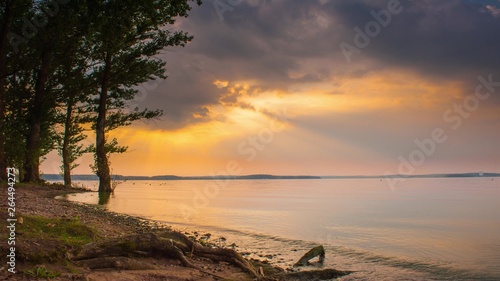 4K sunset beautiful summer landscape with cloudy sky and natural lake photo