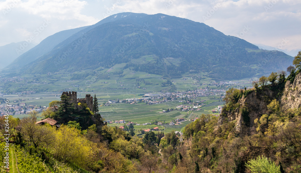 View on Castle Brunnenburg inside Valley and Alps of Meran Landscape. Tirol Village, Province Bolzano, South Tyrol, Italy.