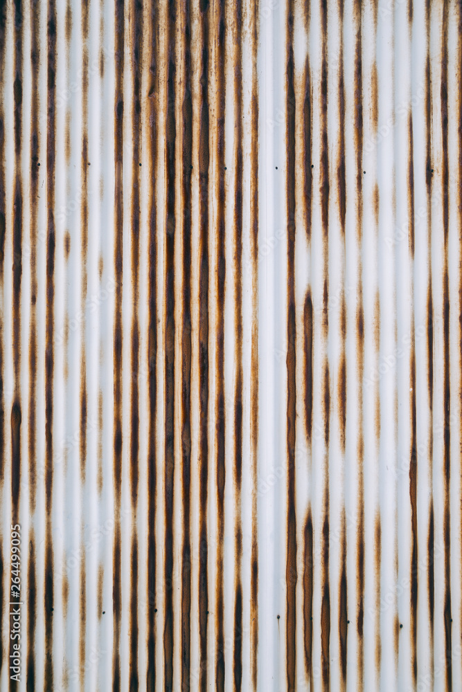 Old rusty wavy metal plate wall background Old rusty wavy metal plate wall background