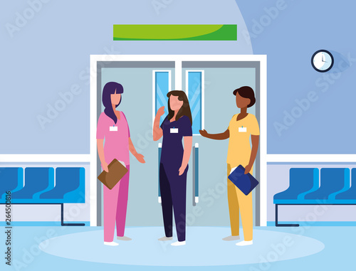 interracial female medicine workers in elevator door