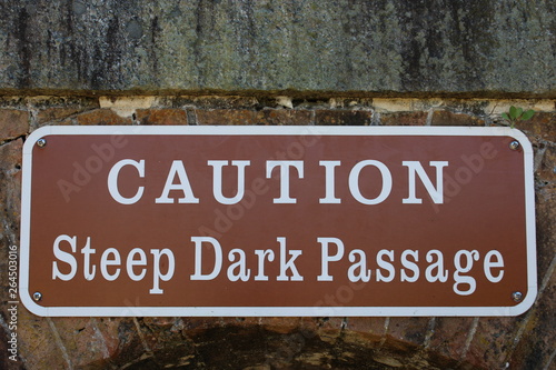 steep dark passage sign