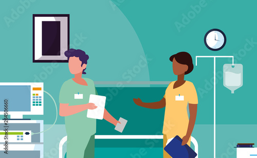 interracial couple medicine workers in operating theater