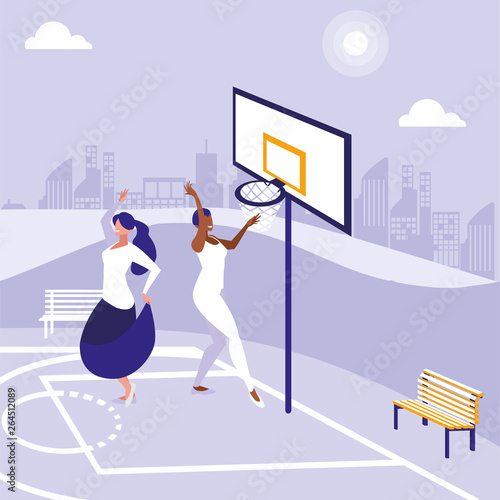 young interracial girls dancing in the park