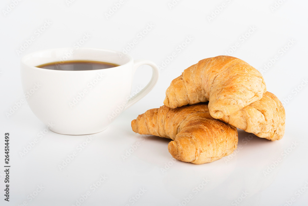 croissant and cup of coffee croissant and cup of coffee