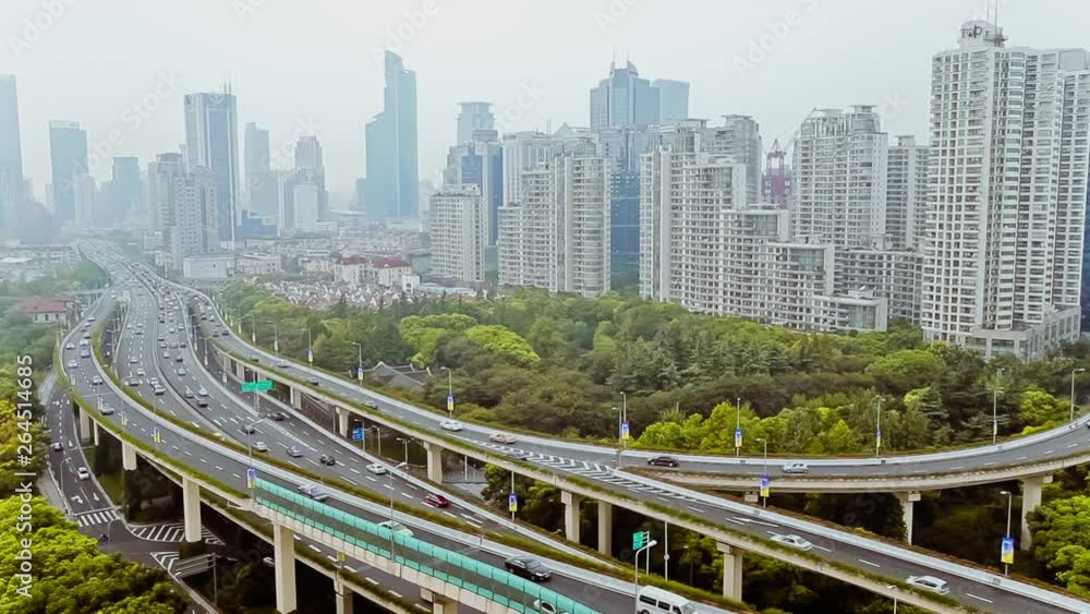 busy traffic over overpass in modern city , Shanghai, China busy traffic over overpass in modern city , Shanghai, China