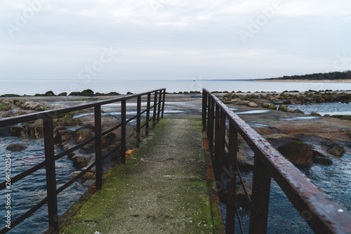  asphalt road leading to the sea