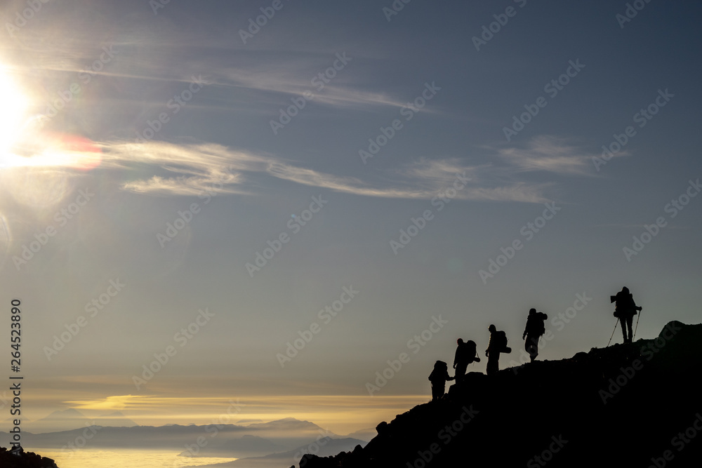 Silhouette hikers