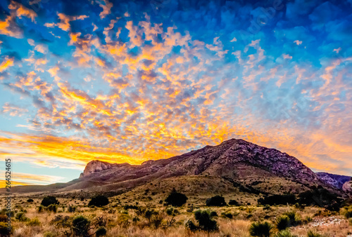 Photos Golden Cloudscape of Texas sunset on the Guadalupe Mountains.