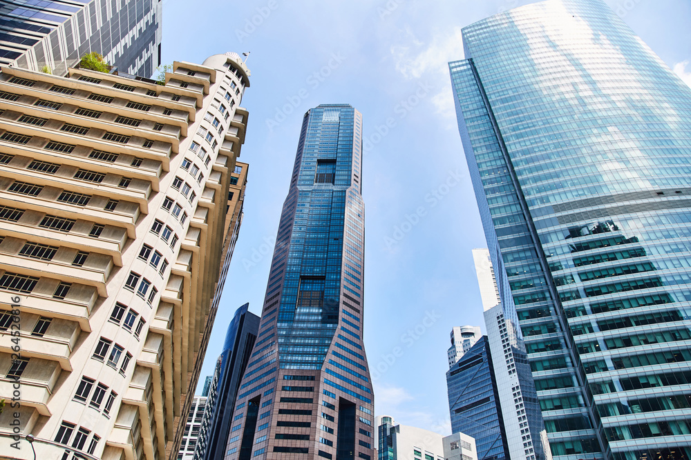 High glass skyscrapers on the streets of Singapore High glass skyscrapers on the streets of Singapore