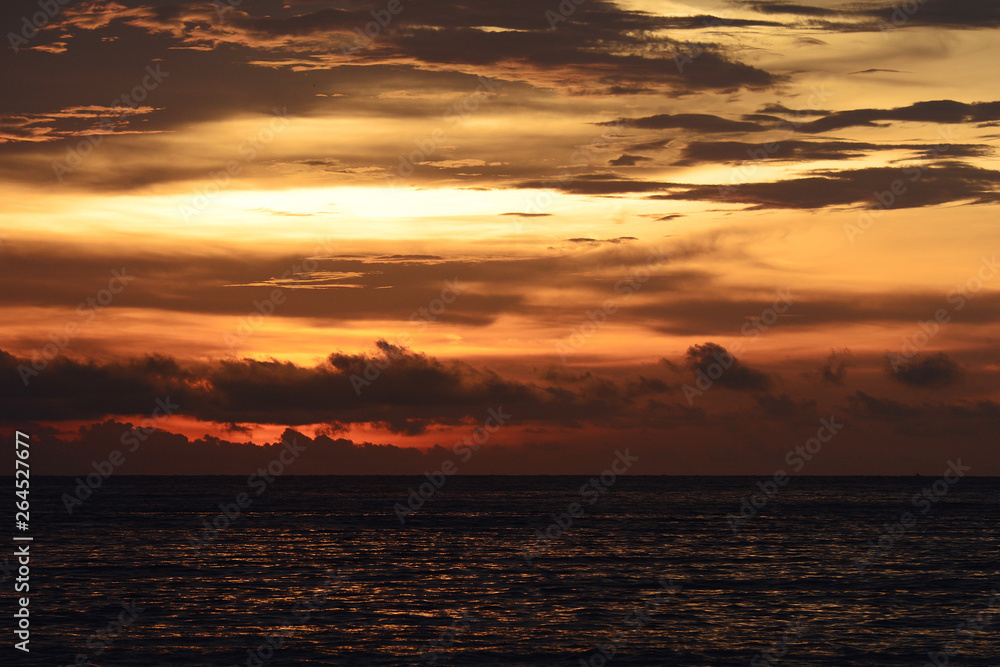 Colorful of sunset on sea scape at Samila Beach, Sunrise over the beach, Phuket, Thailand.