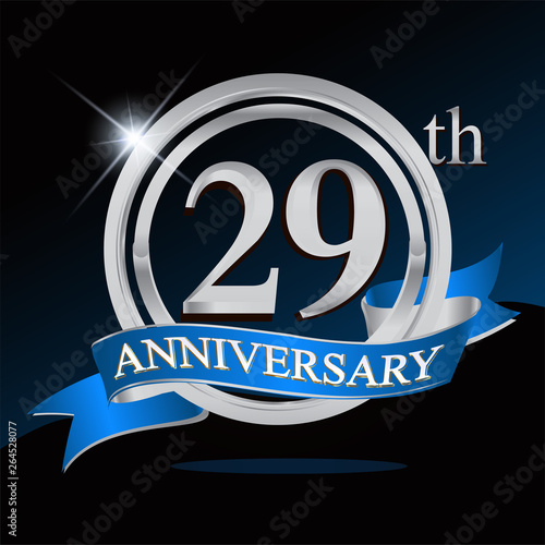 29th anniversary logo with blue ribbon and silver ring, vector template for birthday celebration.