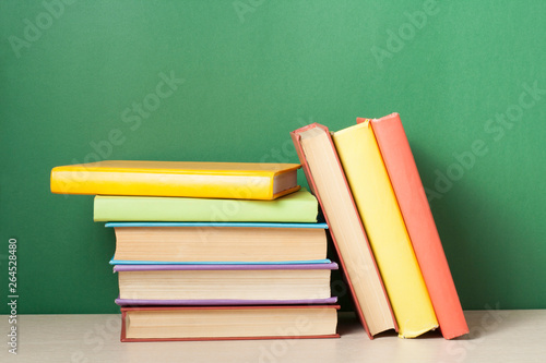 Stack of colorful books. Education background. Back to school. Copy space for text.