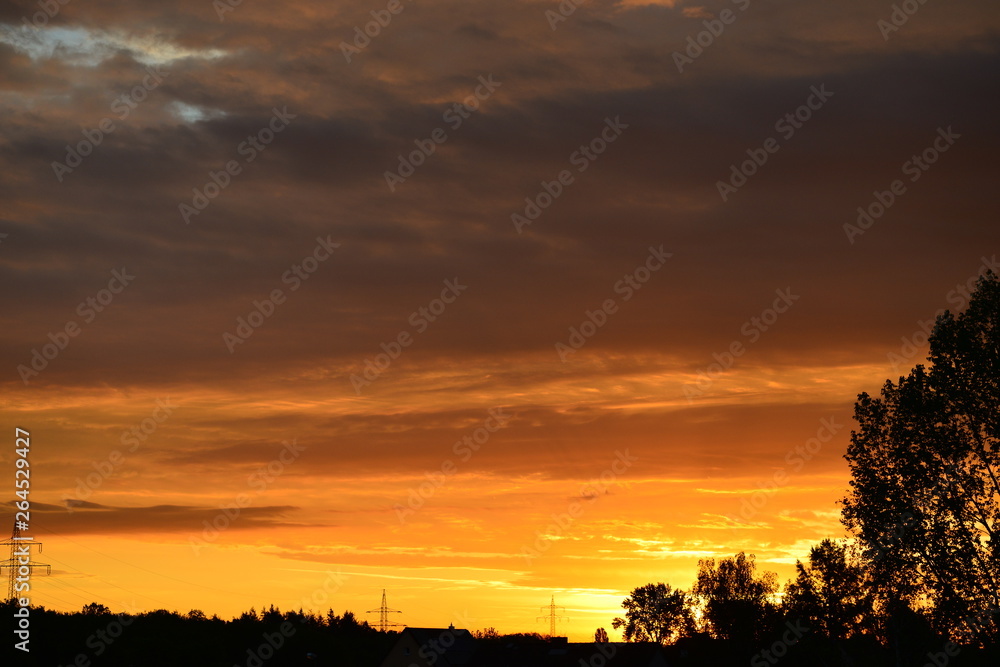 sky with orange clouds in the morning sky with orange clouds in the morning