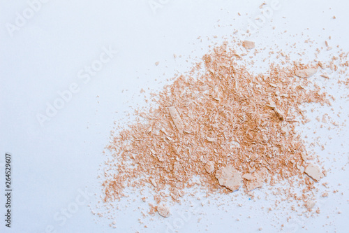 Face powder stroke isolated on white background. Make up. Beauty textures .Cosmetic background for beauty, fashion blog. Crumbling Face powder