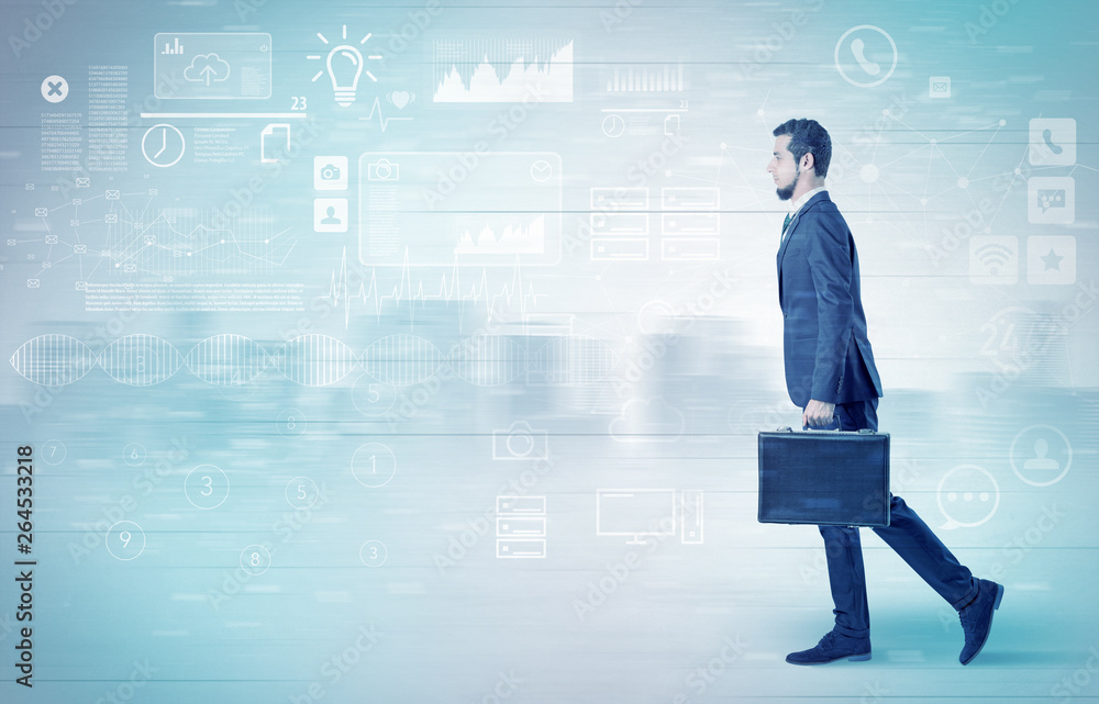 Handsome businessman walking in suit with briefcase on his hand and database concept around
Handsome businessman walking in suit with briefcase on his hand and database concept around