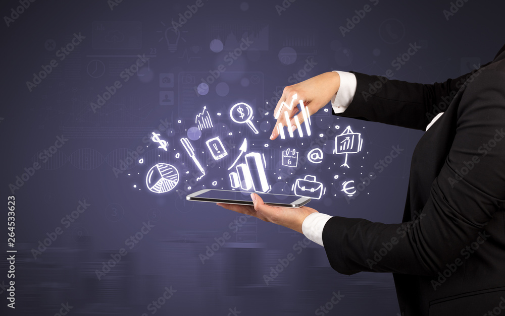 Elegant hand holding tablet with chalk drawn social media symbols above
Elegant hand holding tablet with chalk drawn social media symbols above
