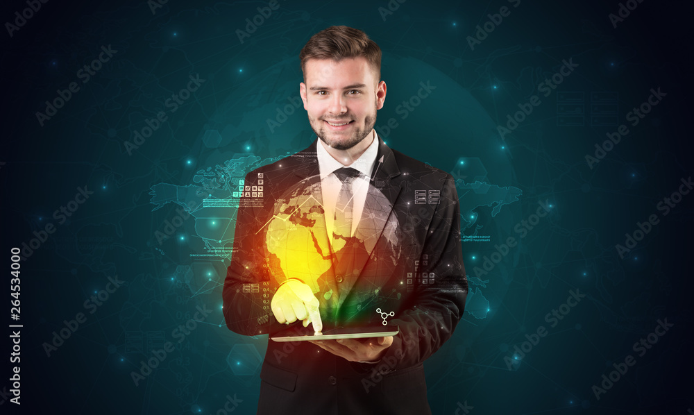Fototapeta premium Spectacled businessman with global hologram concept and tablet on his hand 