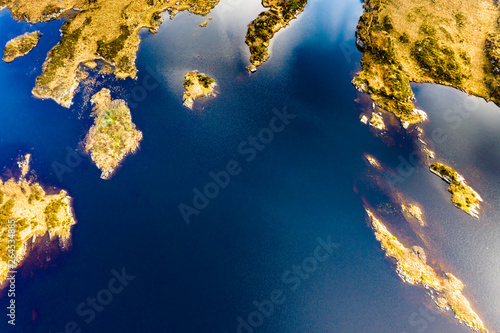 Aerial view of Lough Doon between Portnoo and Ardara which is famous for the medieval fort - County Donegal - Ireland photo