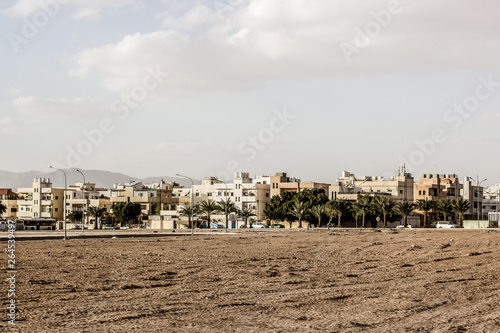 poor Middle East ghetto city buildings in desert dry outdoor environment third world country landmark 