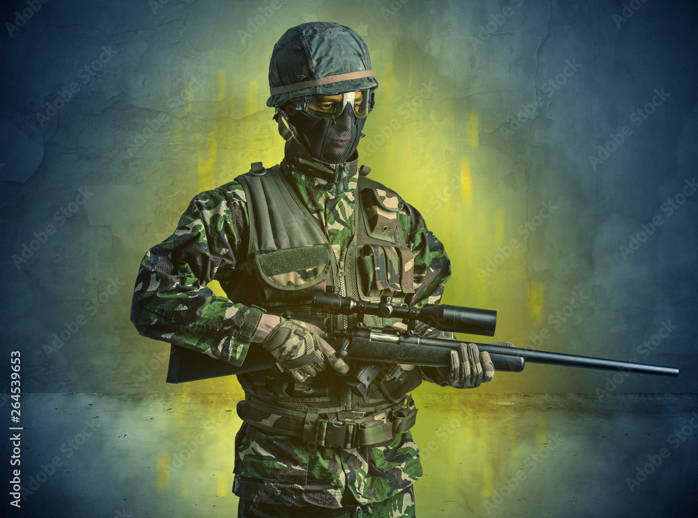 Hazard, menace soldier in a ruined crumbly building with arms on his hand
Hazard, menace soldier in a ruined crumbly building with arms on his hand