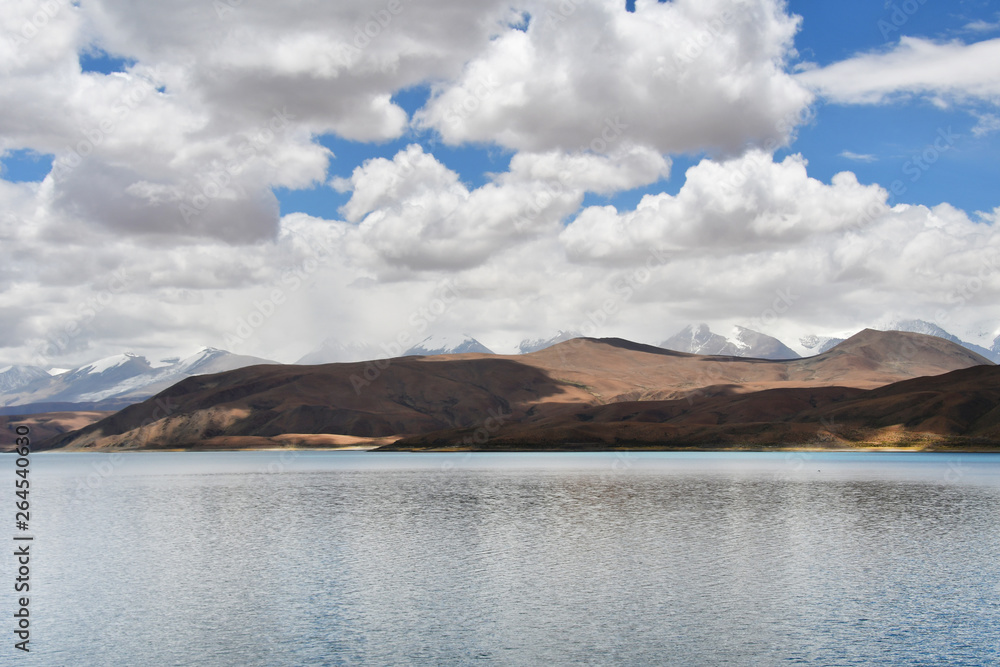 Great lakes of Tibet. Lake Rakshas Tal (Langa-TSO) in summer in cloudy day Great lakes of Tibet. Lake Rakshas Tal (Langa-TSO) in summer in cloudy day
