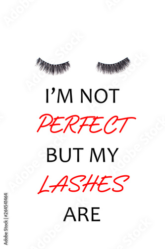 Pair of long false lashes over the white background.
