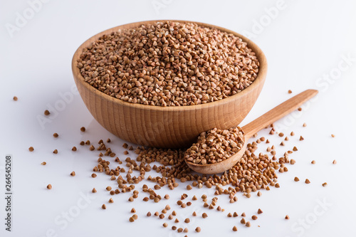 Grain buckwheat on a white acrylic background