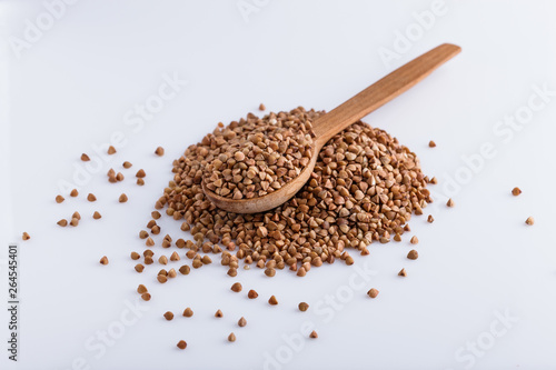 Grain buckwheat on a white acrylic background