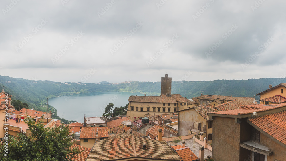 Lake Nemi and buildings of the town of Nemi, in the Alban Hills south of Rome, Italy