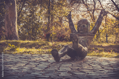 Scultpture of a boy in a park