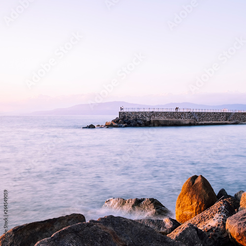 Pizzo calabro long exposure pier and rocks photo